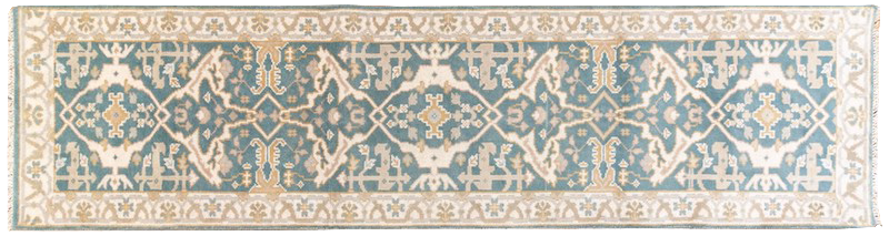 a hand-knotted Oushak runner in soft blue-gray-green and creams.